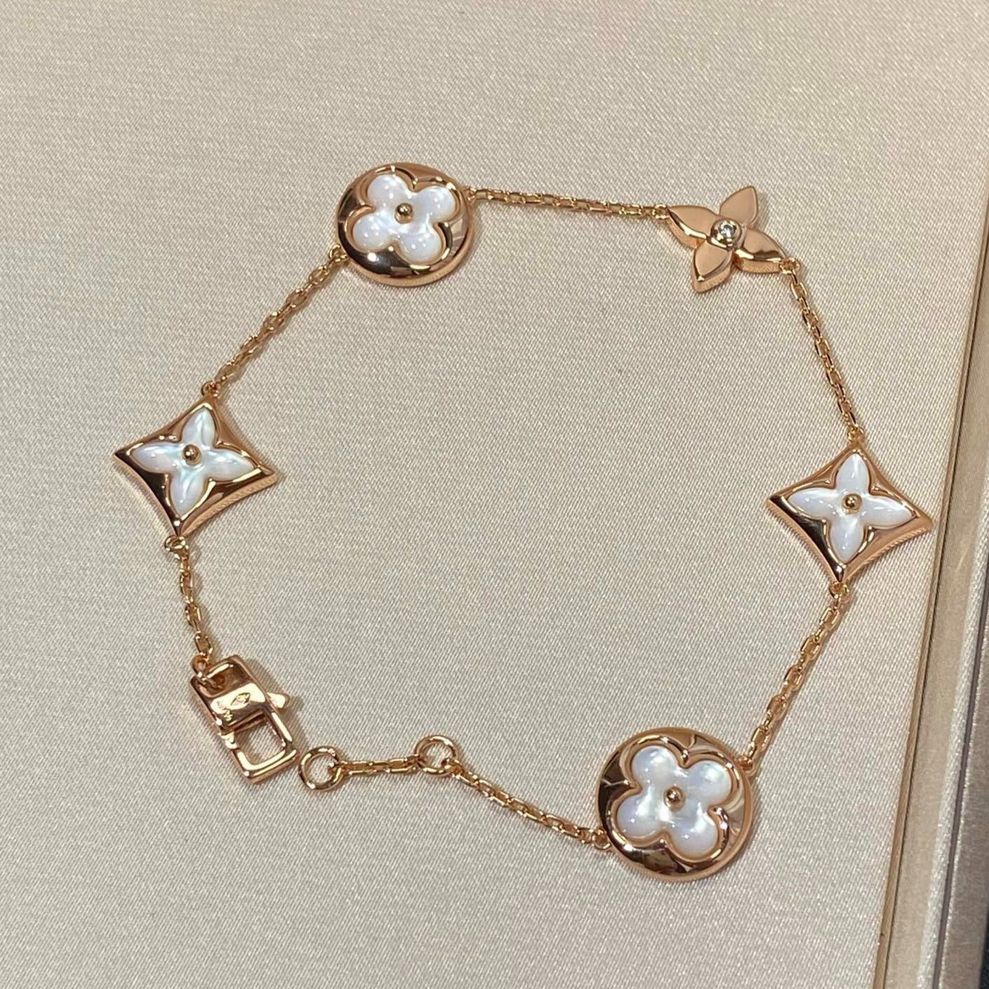 [Elite]STAR AND SUN 5 MOTIF MOP PINK GOLD BRACELET