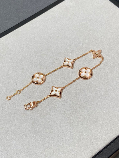 [Elite]STAR AND SUN 5 MOTIF MOP PINK GOLD BRACELET